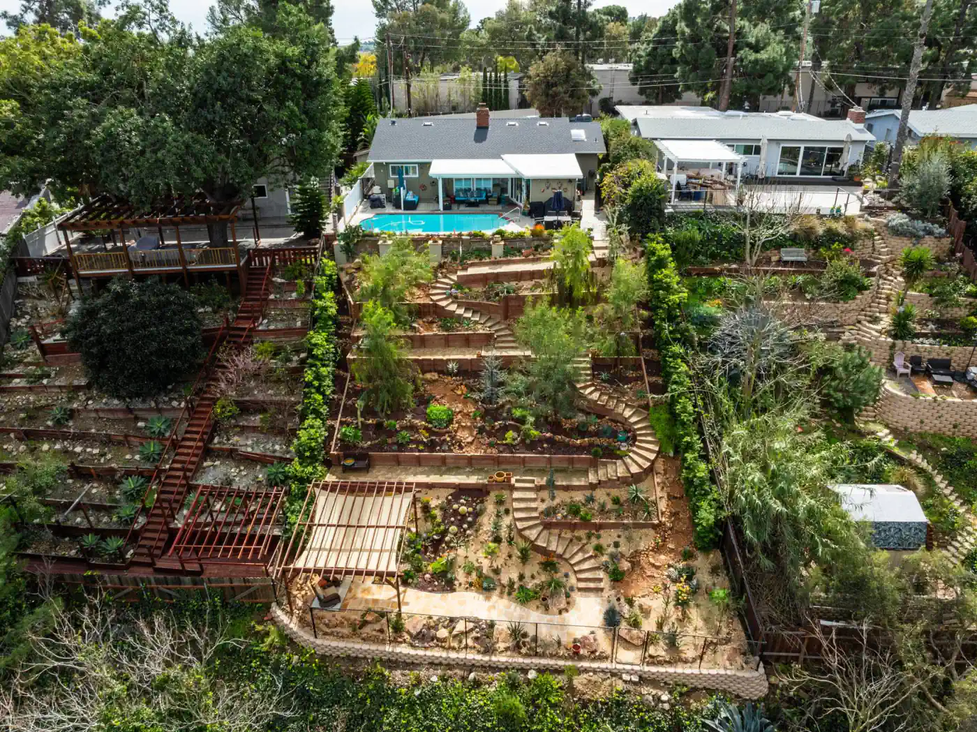 Aerial view of a terraced hillside garden built by Vitoli Builders in Los Angeles County