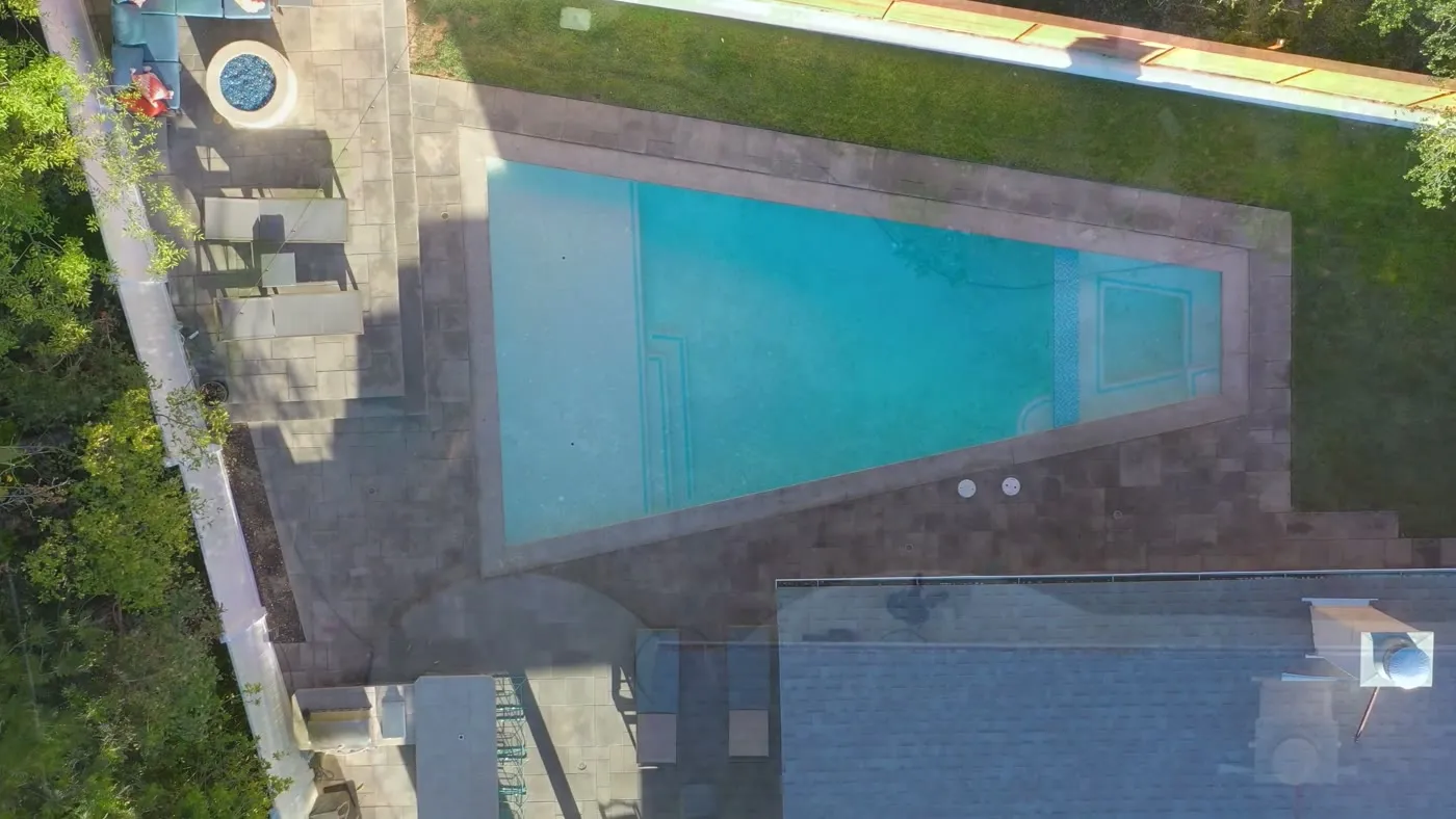 Overhead view of the pool, sun ledge, and deck