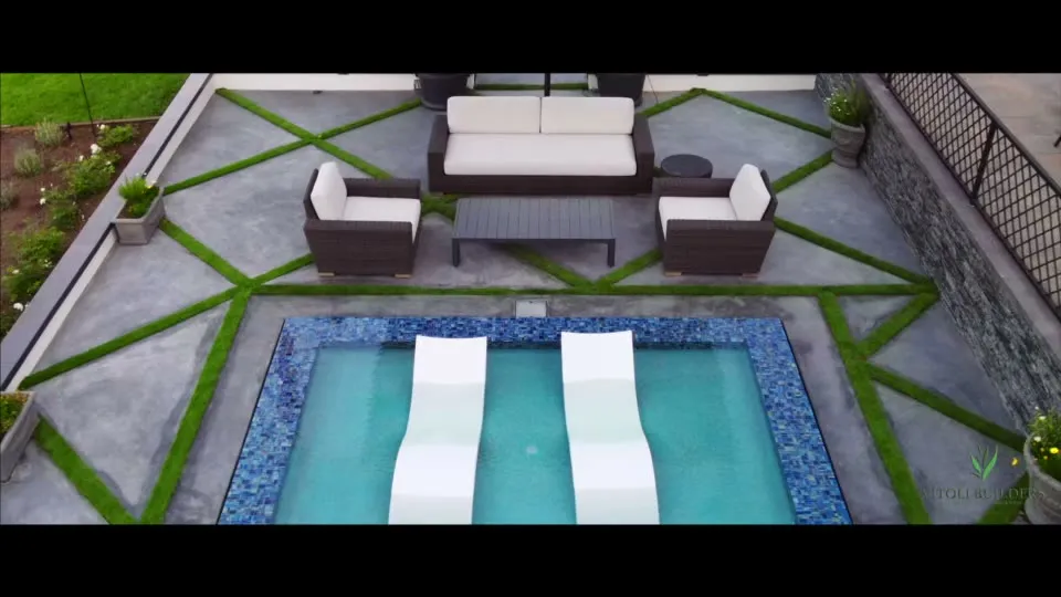 Linear pool and terrace seen from the fairway side